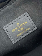 NOE PURSE 11.5 NANO CHARM BLACK CALFSKIN