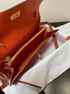 kelly to go wallet 20.5 orange epsom gold hardware