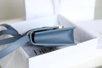 CD Momtaigne Enamel Polished Bag Sky Blue Calfskin