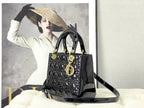 medium lady 24 black patent calfskin
