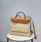 Herbag 31 Toile Light Beige Canvas Gold Cowhide Leather