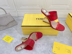 FENDI FIRST 95 MM HIGH-HEELED SANDAL IN CHERRY RED TPU FILM AND LAMBSKIN