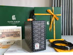GRAND HÔTEL TRUNK BAG 24 IN BLACK GOYARDINE CANVAS AND CALFSKIN