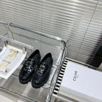MARGARET CHUNKY LOAFER WITH FRINGES AND TRIOMPHE CHAIN IN POLISHED BULL BLACK