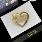 CD Brooch 178845