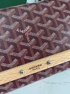MONTE-CARLO PM CLUTCH 25 IN WINE RED GOYARDINE CANVAS