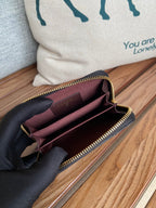 cc zipped wallet 7.5cm black calfksin gold hardware