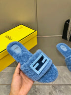 FENDI BAGUETTE SLIDE SLIPPERS IN CERULEAN BLUE WOOL