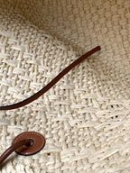 Medium anagram basket bag in iraca palm and calfskin