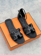 0ran sandal black white epsom