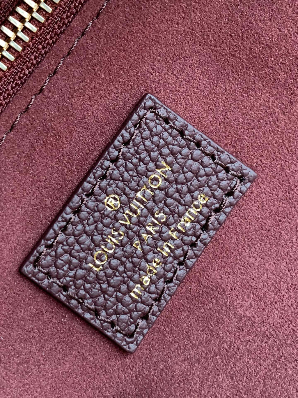 NEVERFULL MM 32 WINE MONOGRAM EMPREINTE LEATHER