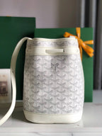PETIT FLOT BUCKET BAG 22 IN WHITE GOYARDINE CANVAS AND LAMBSKIN TRIM