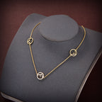 F LOGO 3 MOTIF GOLD DIAMOND NECKLACE