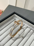 WIDE HINGED BANGLE PINK GOLD WITH BAGUETTE DIAMONDS