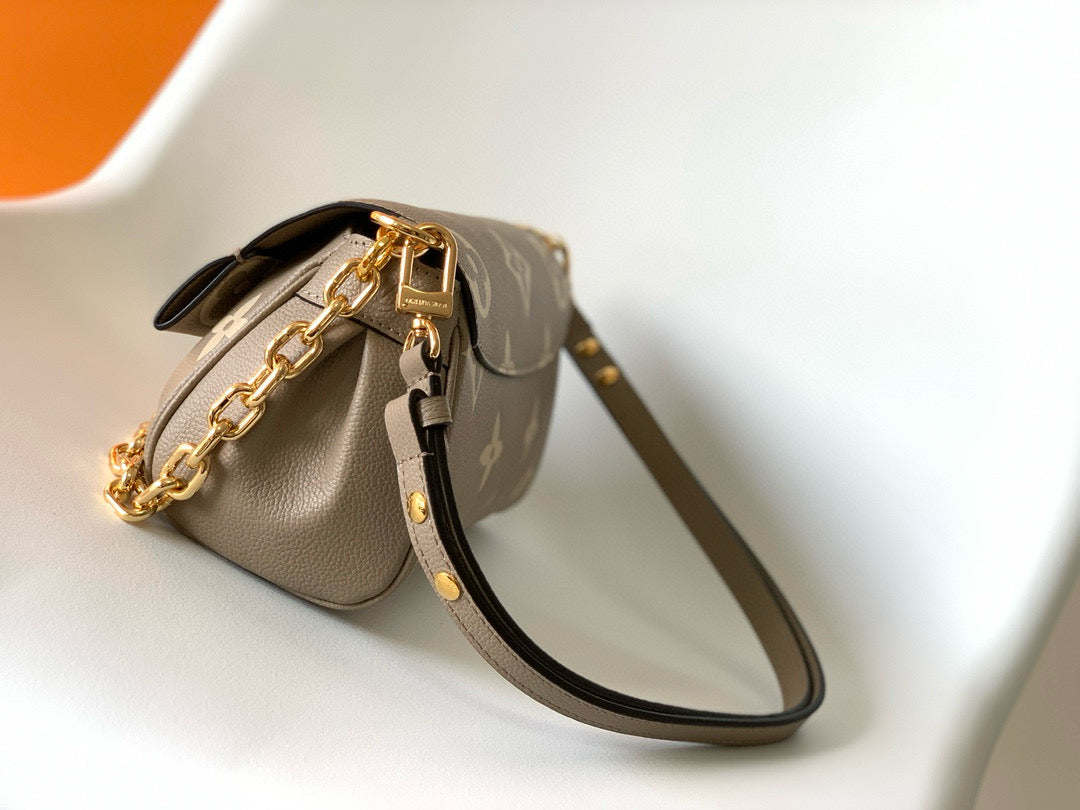 favorite 24 dove cream biocolor monogram empreinte leather