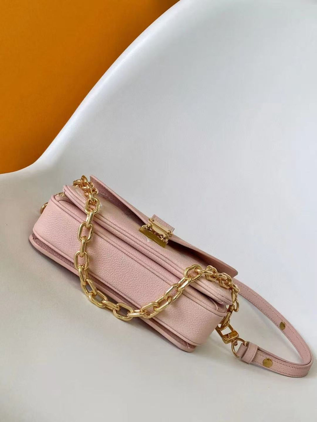 Pochette Metis East West 21.5 Pink White Monogram Empreinte Calfskin