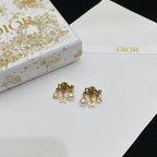 CD DioRevolution Earrings Gold-Finish Metal