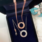 DIAMOND AND MOTHER OF PEARL CIRCLE PENDANT