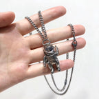 GALAXY ASTRONAUT NECKLACE