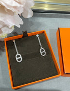 H PLAIN SILVER AB PIG NOSE EARRINGS