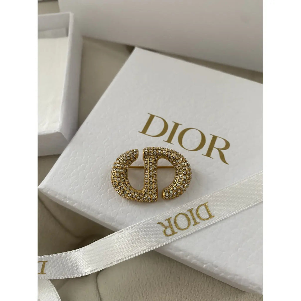 CD Brooch 173982