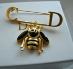 CD Brooch 11