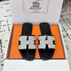 HM 26ss Oran Sandals Black White Canvas Cowhide 617213