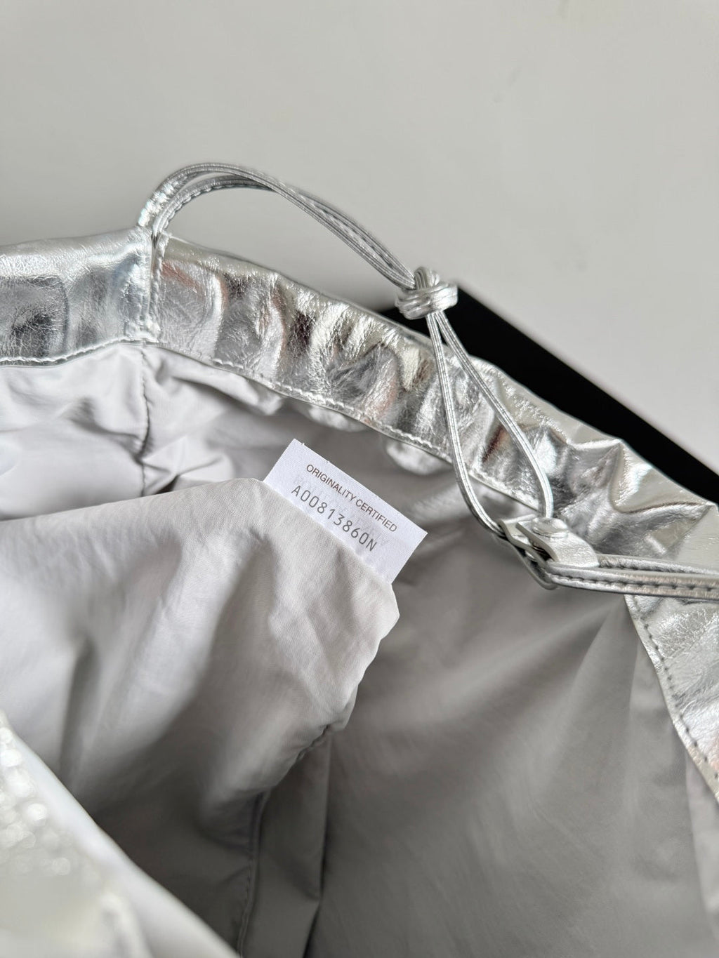 Bottega Veneta 2026 Dust Bag Silver Laminated Leather