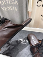 Prada 25s mule dark brown sheepskin 535501