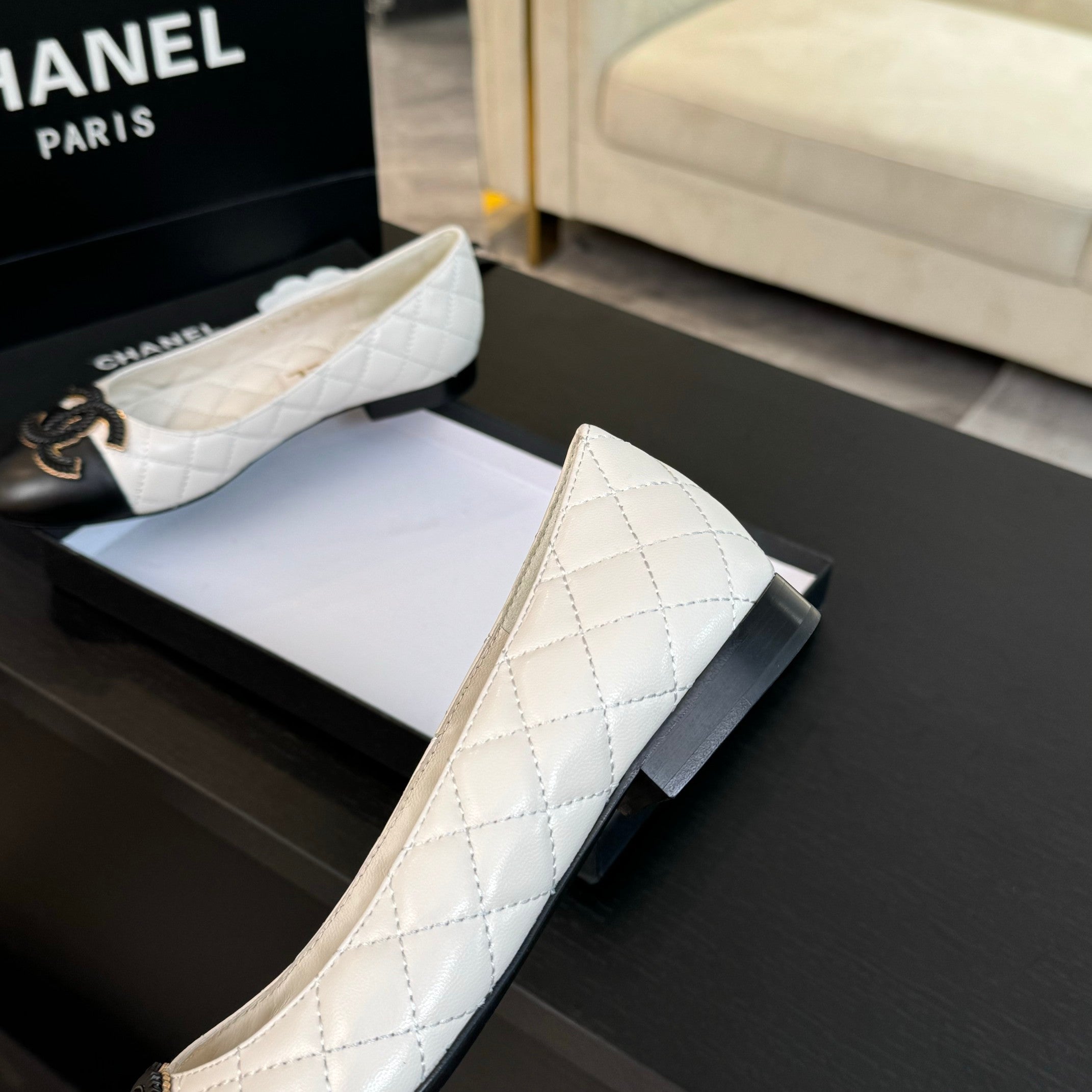 ballet flat white quilted lambskin large black cc logo