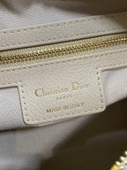 Dior 2025 Voyage Bag 23cm Powder Beige Grained Calfskin 267772