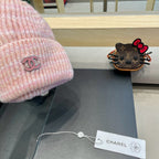 STRIPED KNITTED HAT IN LIGHT PINK WOOL 424515