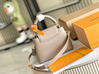 CAPUCINES MINI 21 DARK BEIGE TAURILLON GOLD HARDWARE