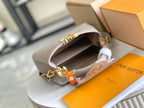 CAPUCINES MINI 21 DARK BEIGE TAURILLON GOLD HARDWARE