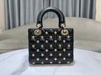 CD Lady Dior Black Cannage Lambskin with Gold-Finish Butterfly Studs