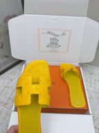 HM 26ss Oran Sandals Yellow Ostrich Leather 625090