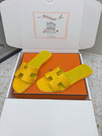 HM 26ss Oran Sandals Yellow Ostrich Leather 625090