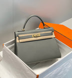 HM KELLY 25CM GRAY TOGO GOLD HARDWARE
