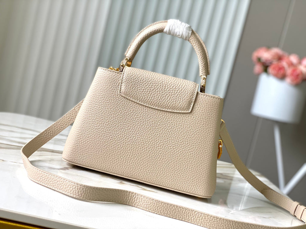 CAPUCINES BB 27CM BEIGE TAURILLON LEATHER