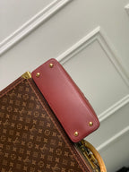capucines mm 31.5 burgundy taurillon leather gold hardware