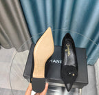 CC MEDIUM HEELS IN BLACK SUEDE AND CALFSKIN WITH FLOWER