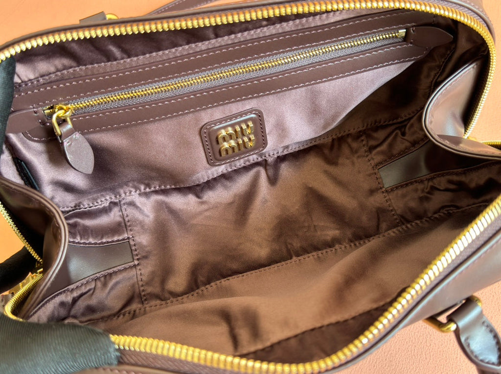 ARCADIE BAG 27 IN COPPER BROWN SHINY CALFSKIN