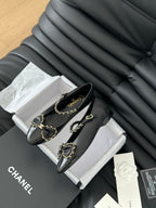 CC BALLET FLATS IN BLACK LAMBSKIN WITH GOLD HARDWARE