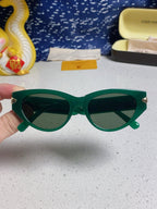 CAT EYE SUNGLASSES 576882 IN GREEN AND GOLD ACETATE