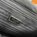 PRA 26 SHOULDER BAG IN BLACK RE-NYLON AND SAFFIANO LEATHER