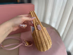 WANDER WICKER HOBO BAG 20 IN BROWN HANDWOVEN WITH PINK CALFSKIN LOGO