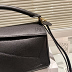 LOE MEDIUM 25 PUZZLE BAG IN BLACK GRAINED CALFSKIN