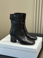 MiuMiu ankle boots black  cowhide 521946