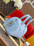 LV Speedy BandouliÃ¨re 20 Blue Monogram Empreinte Leather
