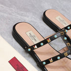 VT 25 Rockstud leather slides Black Sheepskin 289663